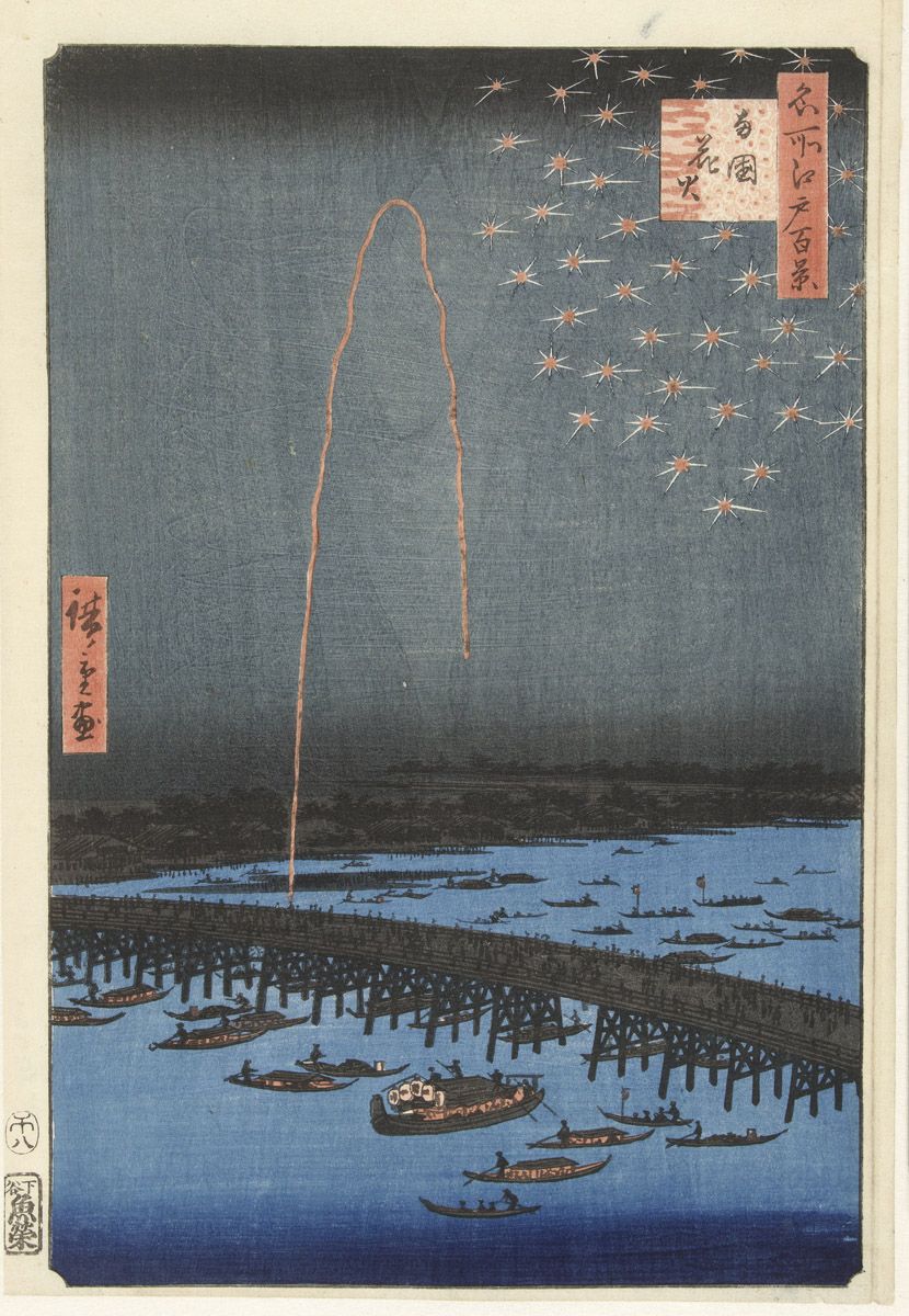 Japanese woodblock print of fireworks over water with boats and a bridge.