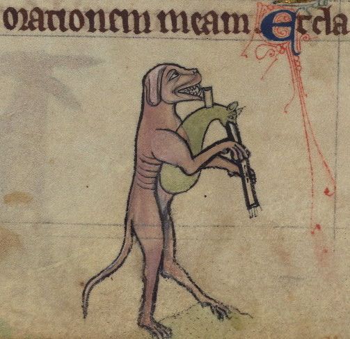 Medieval manuscript illustration of a dog attacking a green cloth covering a weapon.