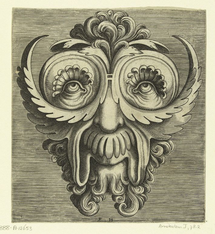 A detailed black and white engraving of a grotesque or fantastical face with ornate eyes, nose, mouth, and beard.