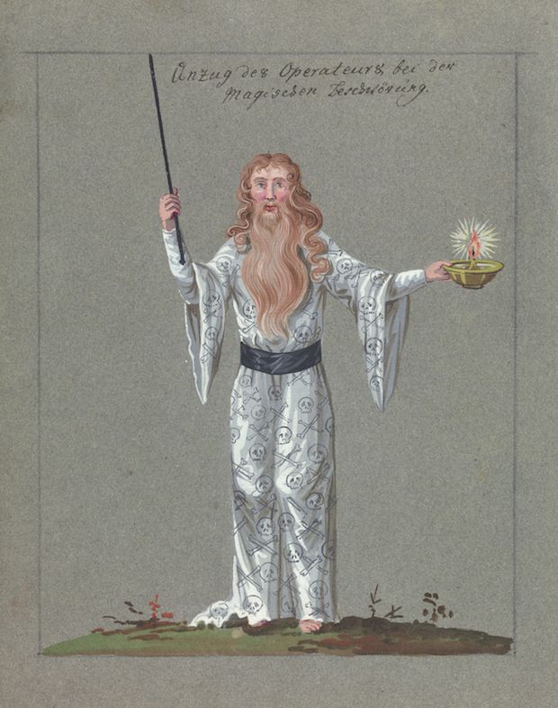 Vintage illustration of a man in a skull-patterned robe holding a staff and candle.