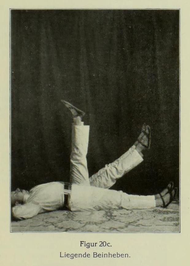 Vintage black and white photograph of a person performing a leg-raising exercise.