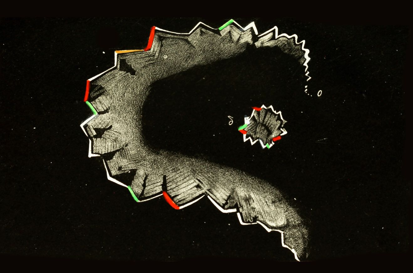 A complex fractal pattern in shades of gray and white against a black background, with red and green highlights along the edges.