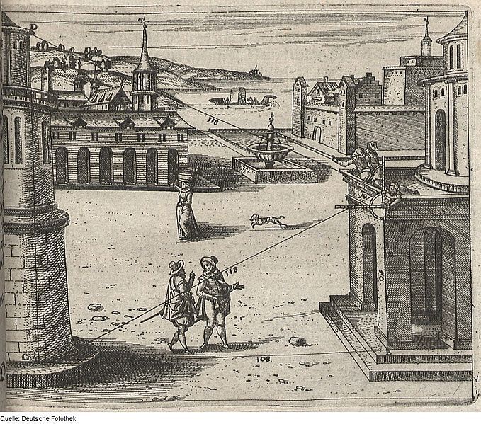 Black and white engraving of a city square with a fountain, buildings, and three men pulling a dog with a rope.