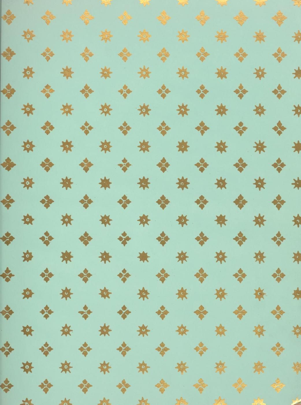 A light teal background covered in a dense pattern of small, golden starburst or floral-like shapes.