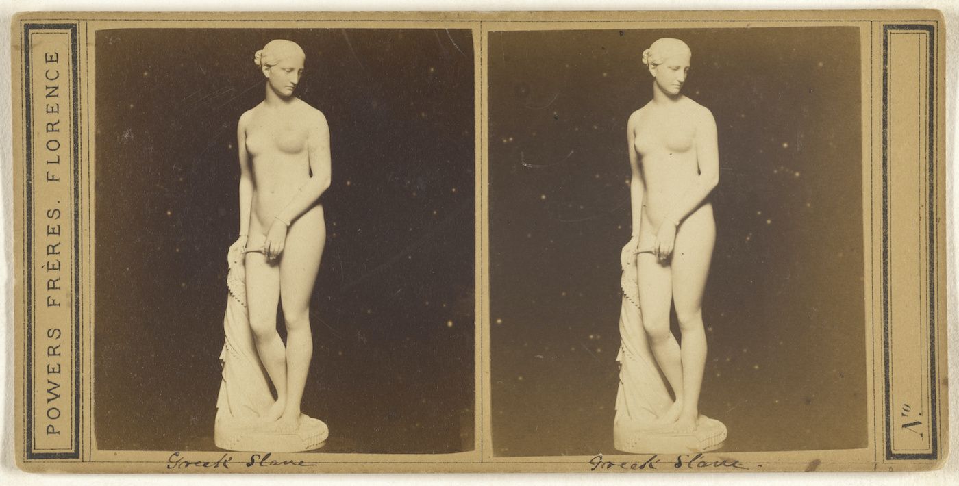 Stereo card featuring a photograph of a classical statue of a nude female figure, labeled 'Greek Slave' and attributed to 'POYERS FRÈRES. FLORENCE'.