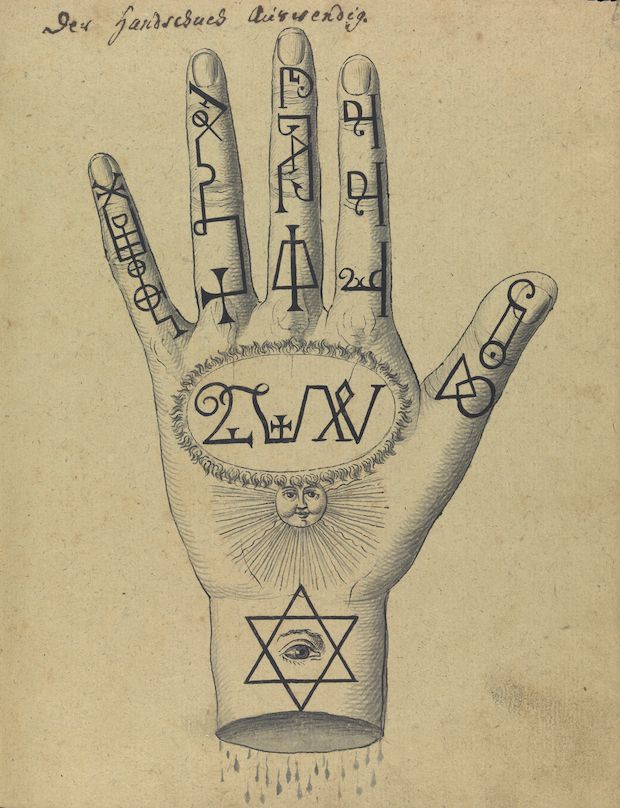 Vintage illustration of an open palm with alchemical symbols and a radiant face.