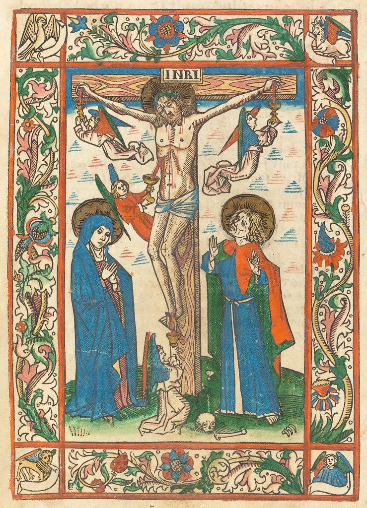 A medieval illuminated manuscript depicting the crucifixion of Jesus Christ, with Mary and Saint John at the foot of the cross, and angels flanking him. The scene is framed by an elaborate floral border.