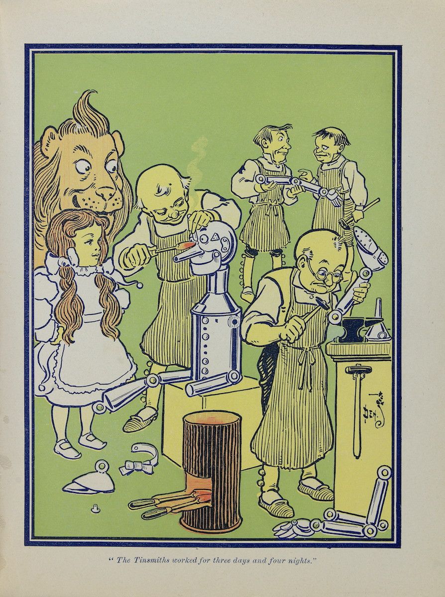 A vintage illustration of Dorothy and several tinsmiths working on constructing the Tin Man in a workshop.