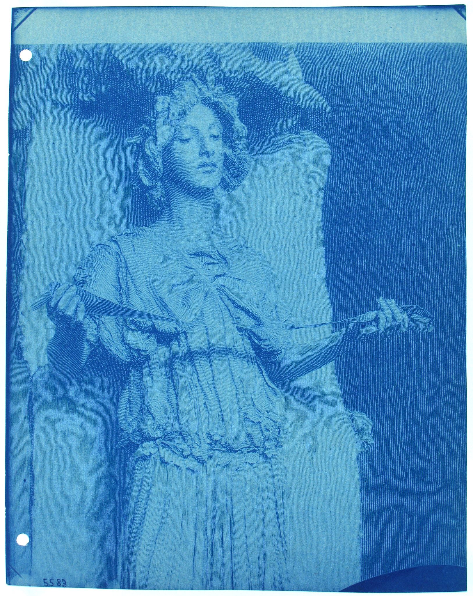 A cyanotype print of a woman in a flowing dress, with her arms outstretched and her eyes closed. The print is monochromatic, with shades of blue, and has some imperfections, such as scratches and stains.