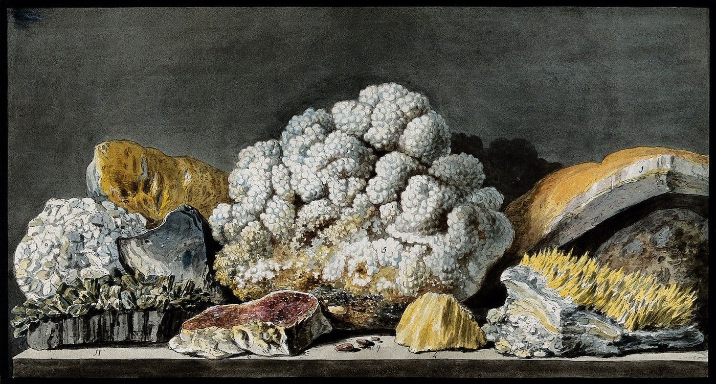 A watercolor painting of a collection of mineral specimens arranged on a dark surface.