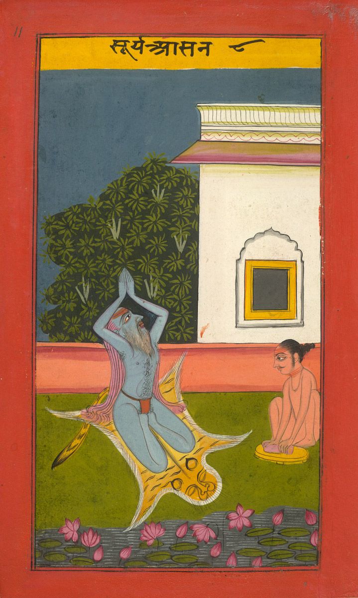 A traditional Indian painting depicting a blue-skinned figure with horns lying on a lotus-filled field, observed by a meditating man, with a building and tree in the background.