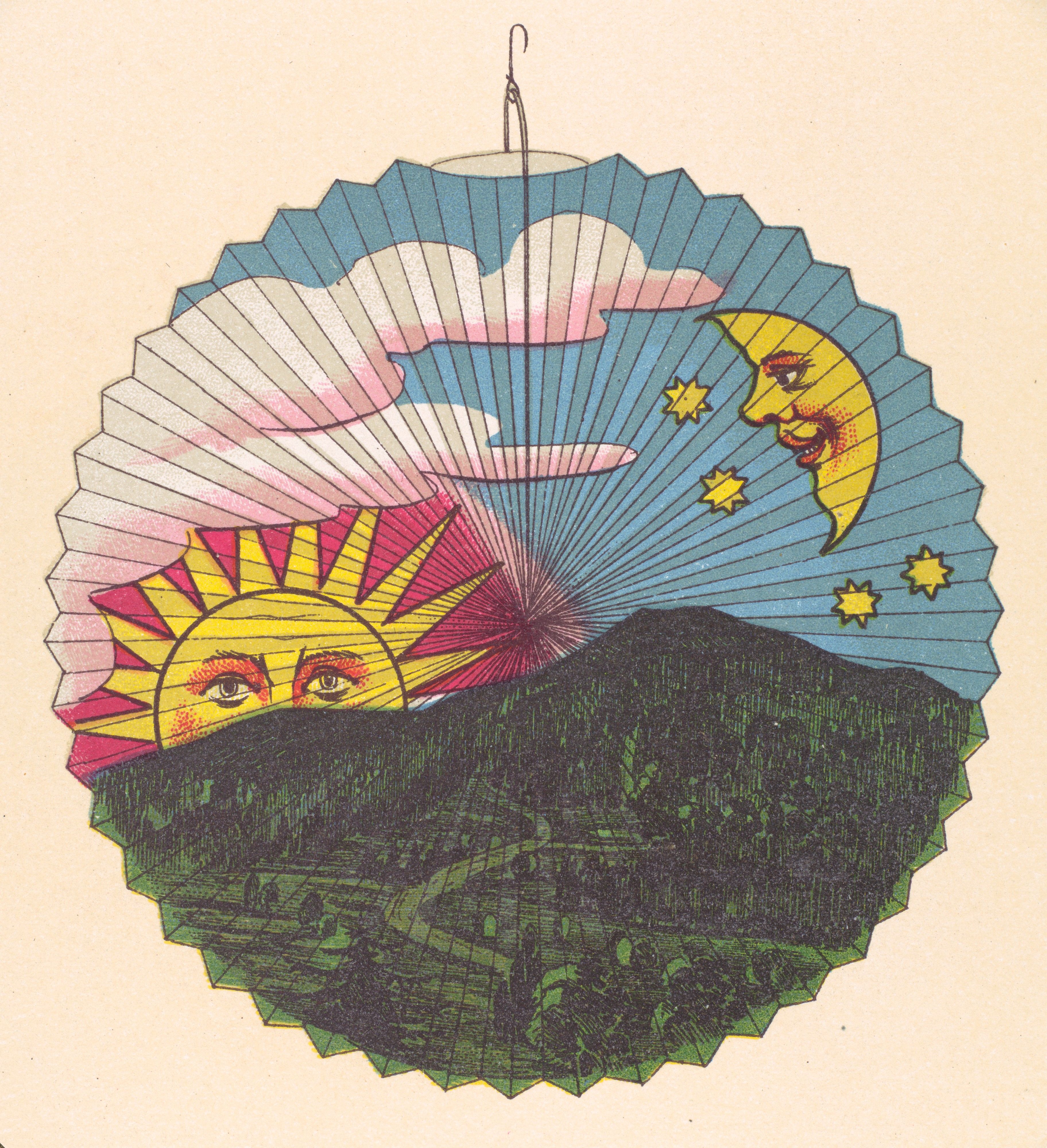 Vintage paper lantern decorated with a sun, moon, stars, and a mountainous landscape.