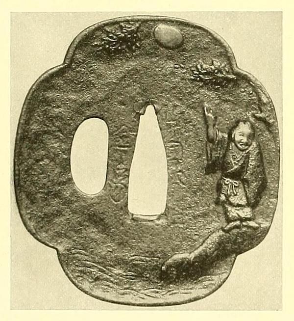 A detailed image of a Japanese tsuba, a sword guard, featuring a sculpted figure of a monk or sage standing on a wave beneath a full moon.