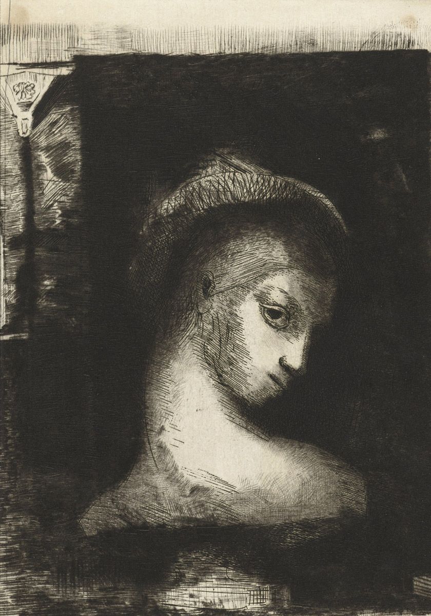 A black and white etching of a woman's head and shoulders in profile, looking downwards and to the right. The style is reminiscent of Rembrandt, with strong contrasts between light and shadow.