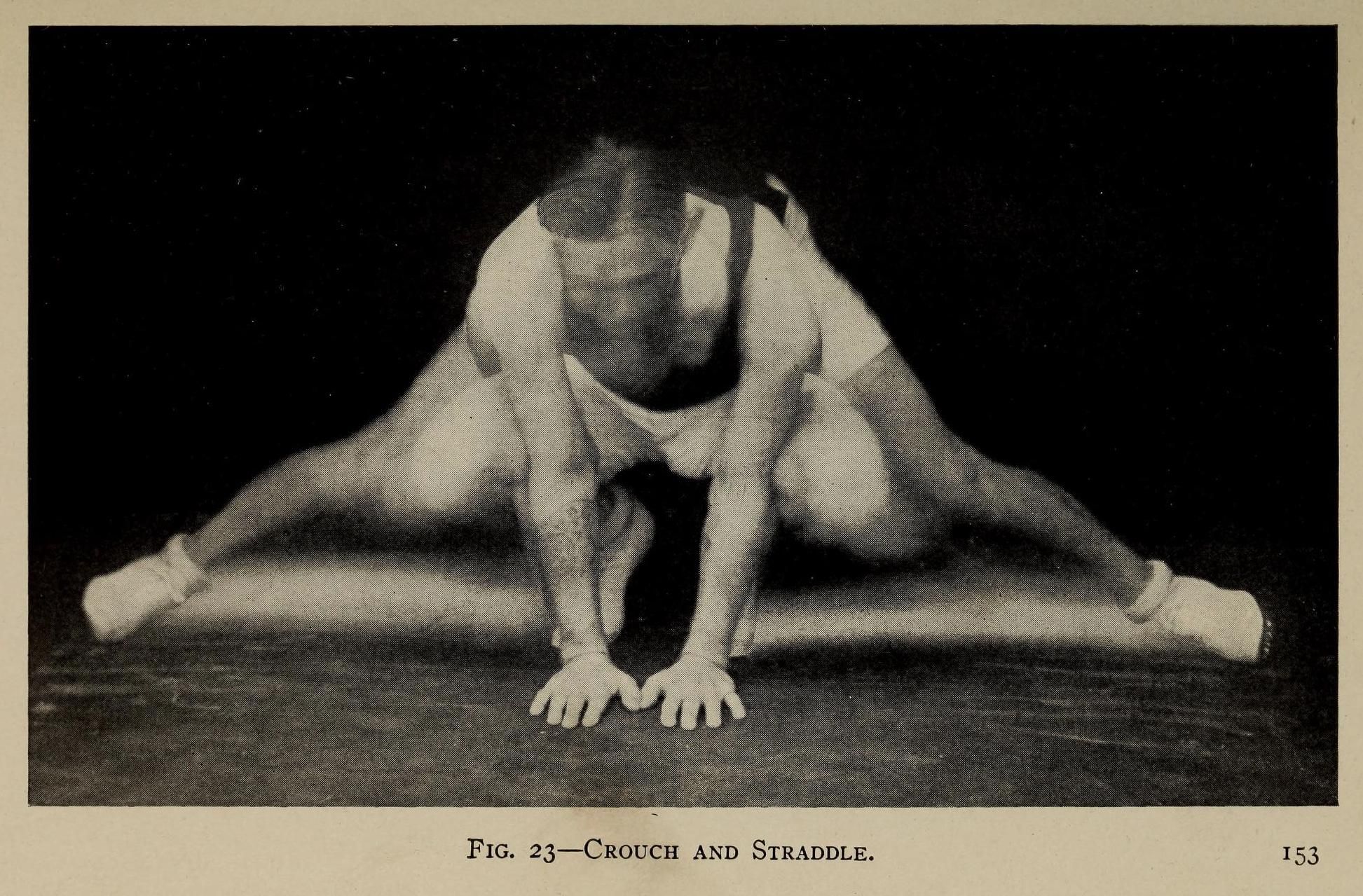 A vintage black and white photograph of a person performing a straddle stretch.