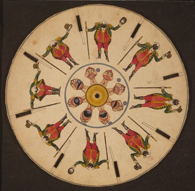 A vintage phenakistoscope disc with a man in a red coat and green pants, holding a cane, arranged in a circular pattern.