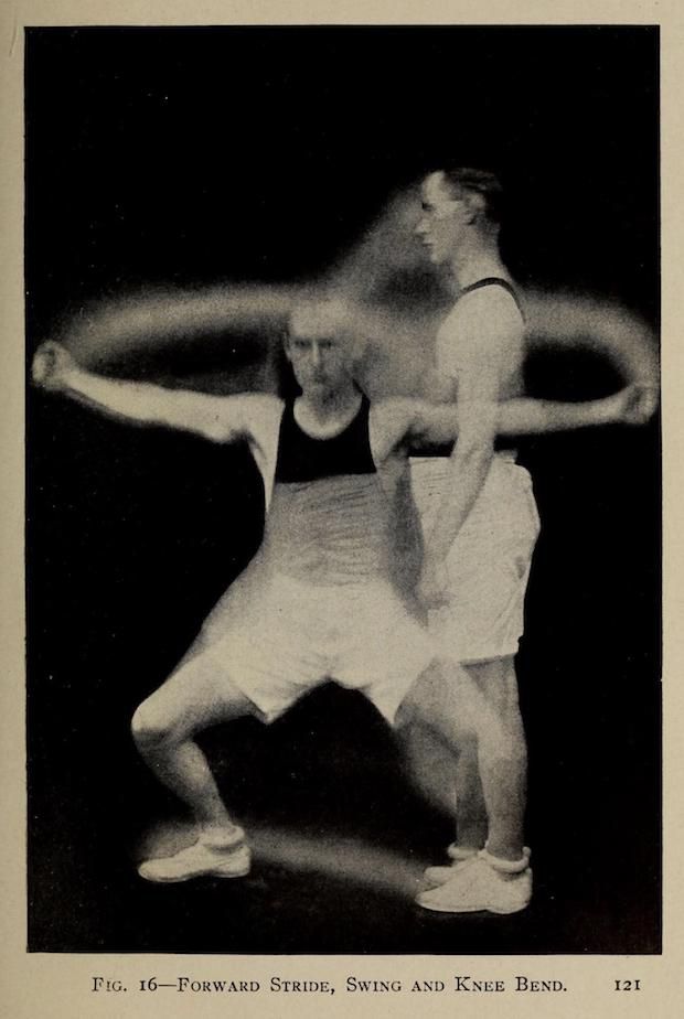 Vintage black and white photograph of two figures performing a forward stride, swing, and knee bend exercise. The image is blurred to emphasize motion.