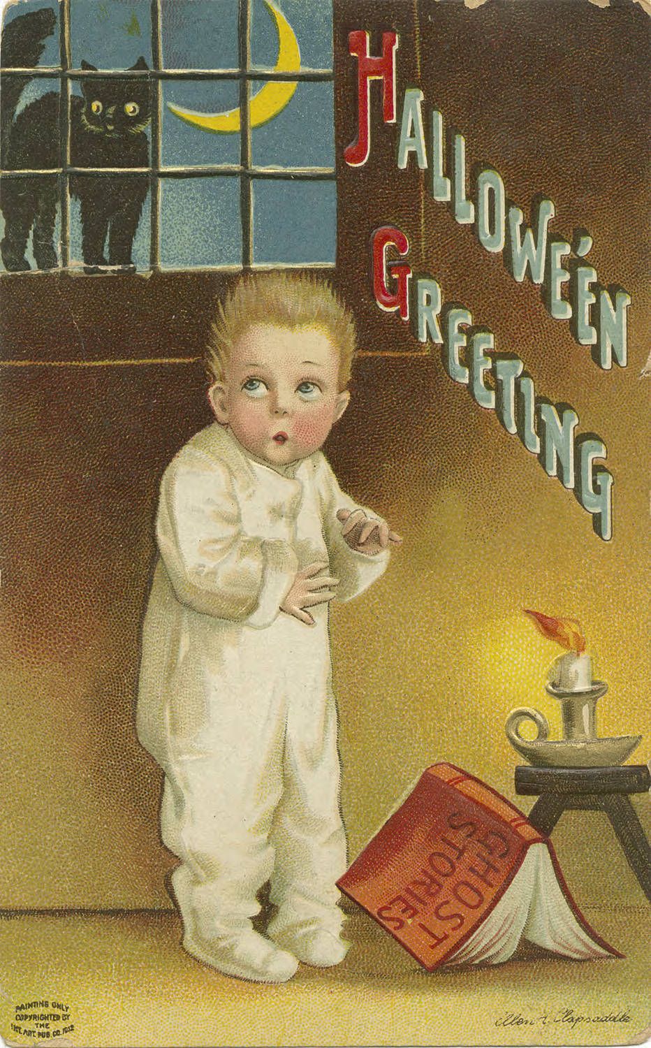 Vintage Halloween postcard featuring a frightened young boy reading a book by candlelight.