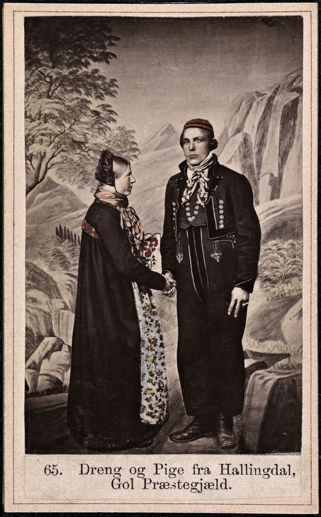 Vintage postcard depicting a man and woman in traditional Norwegian folk costumes standing in a landscape.