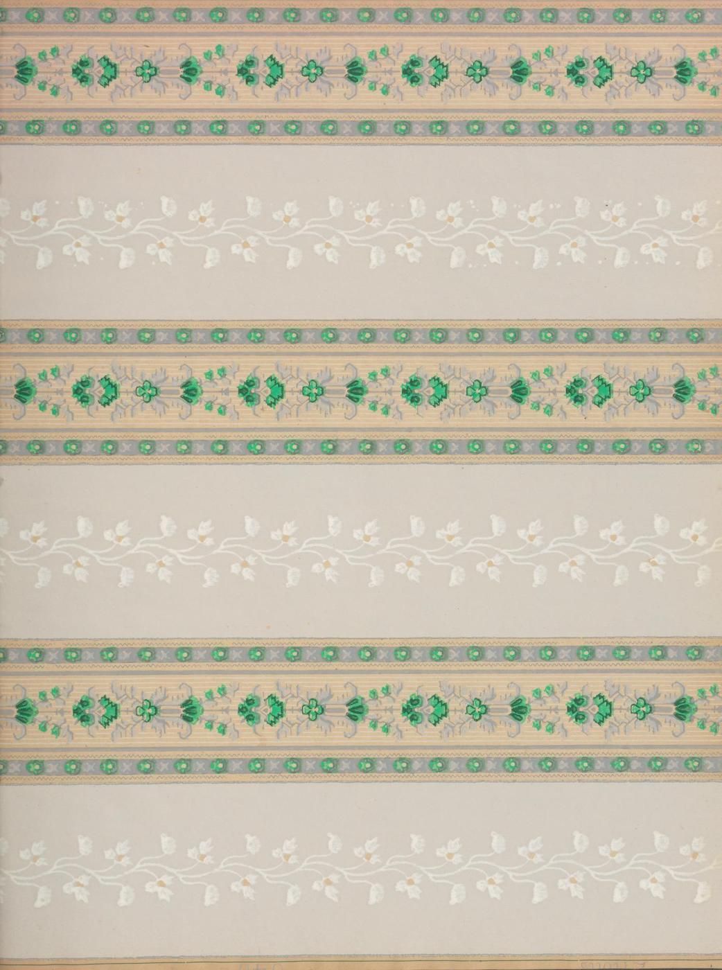 Close-up of a patterned fabric with alternating stripes of floral and vine designs in green, gold, and beige.