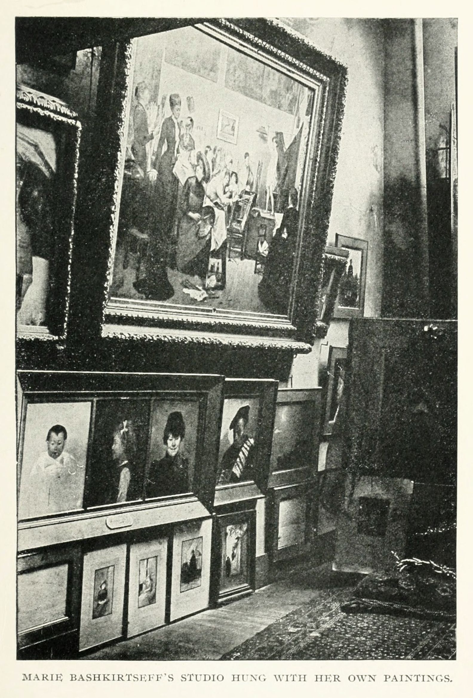 Black and white photograph of Marie Bashkirtseff's studio, filled with her paintings.
