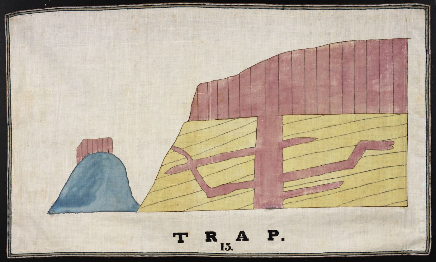 Vintage illustration of a geological formation labeled 'TRAP. 15.' with a hill and layered rock formation.