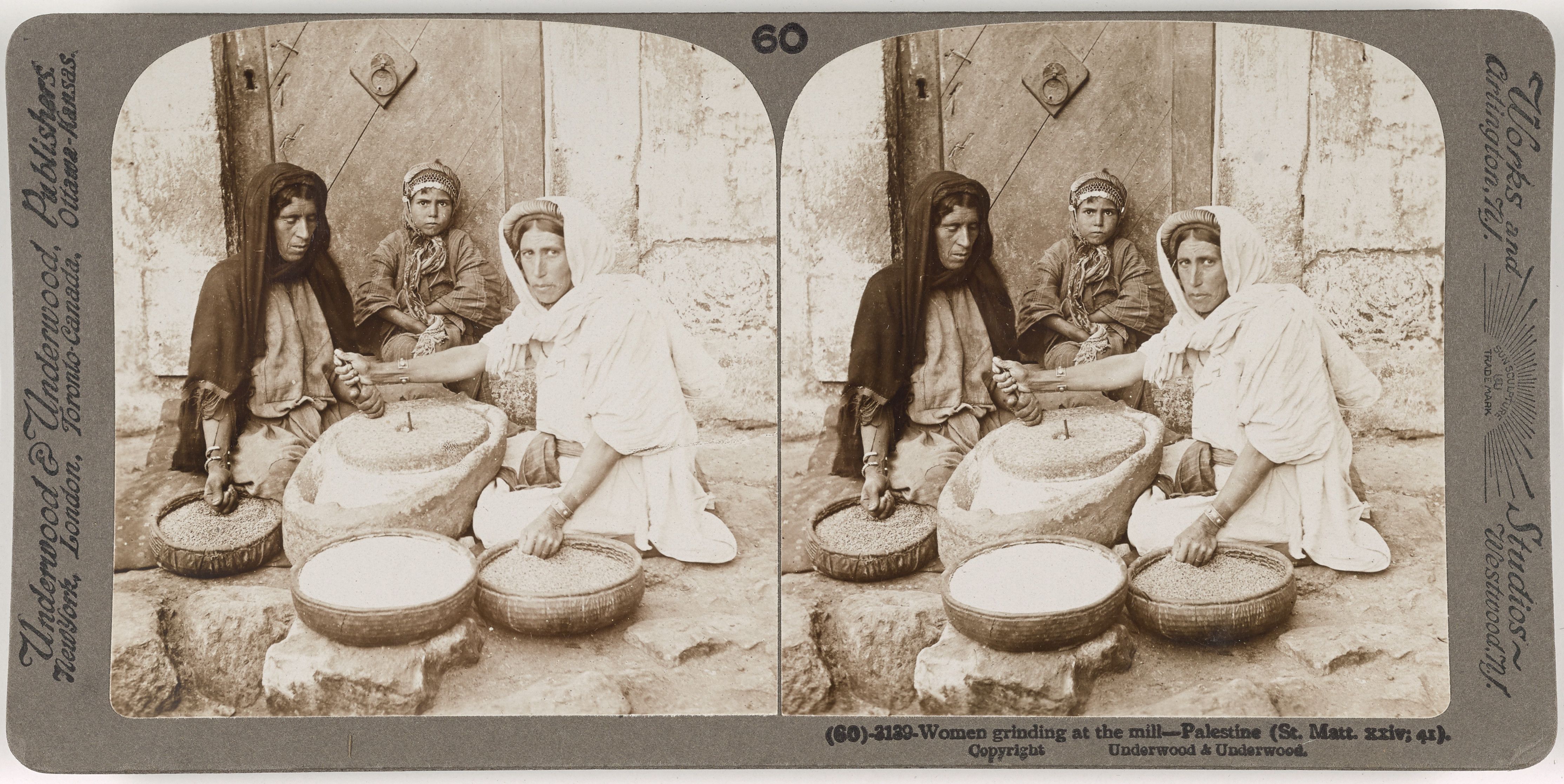 Stereoscopic photograph of two women grinding grain at a mill in Palestine.