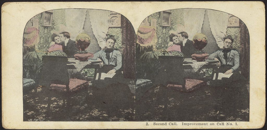 Stereo card depicting a man and woman in a Victorian-era room, engaged in a dramatic conversation.