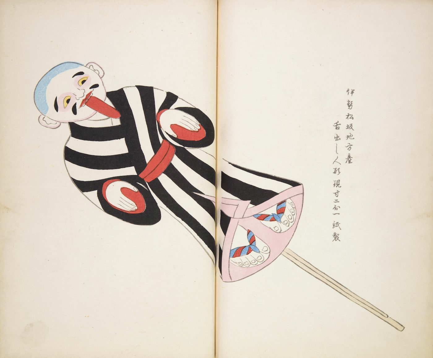 A traditional Japanese painting of a bald figure in a black and white striped costume with a red tongue sticking out, holding a golden stick.