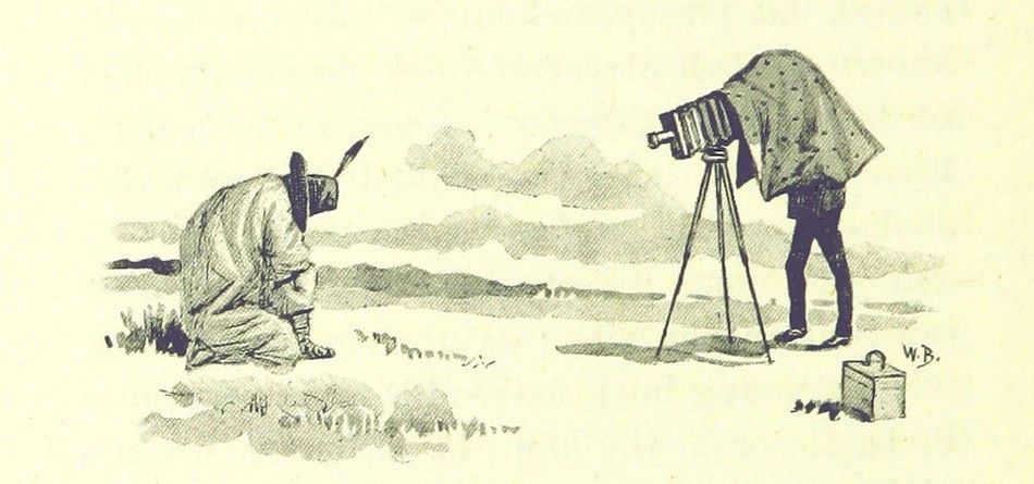 Vintage illustration of a photographer taking a picture of a Native American person in a landscape.