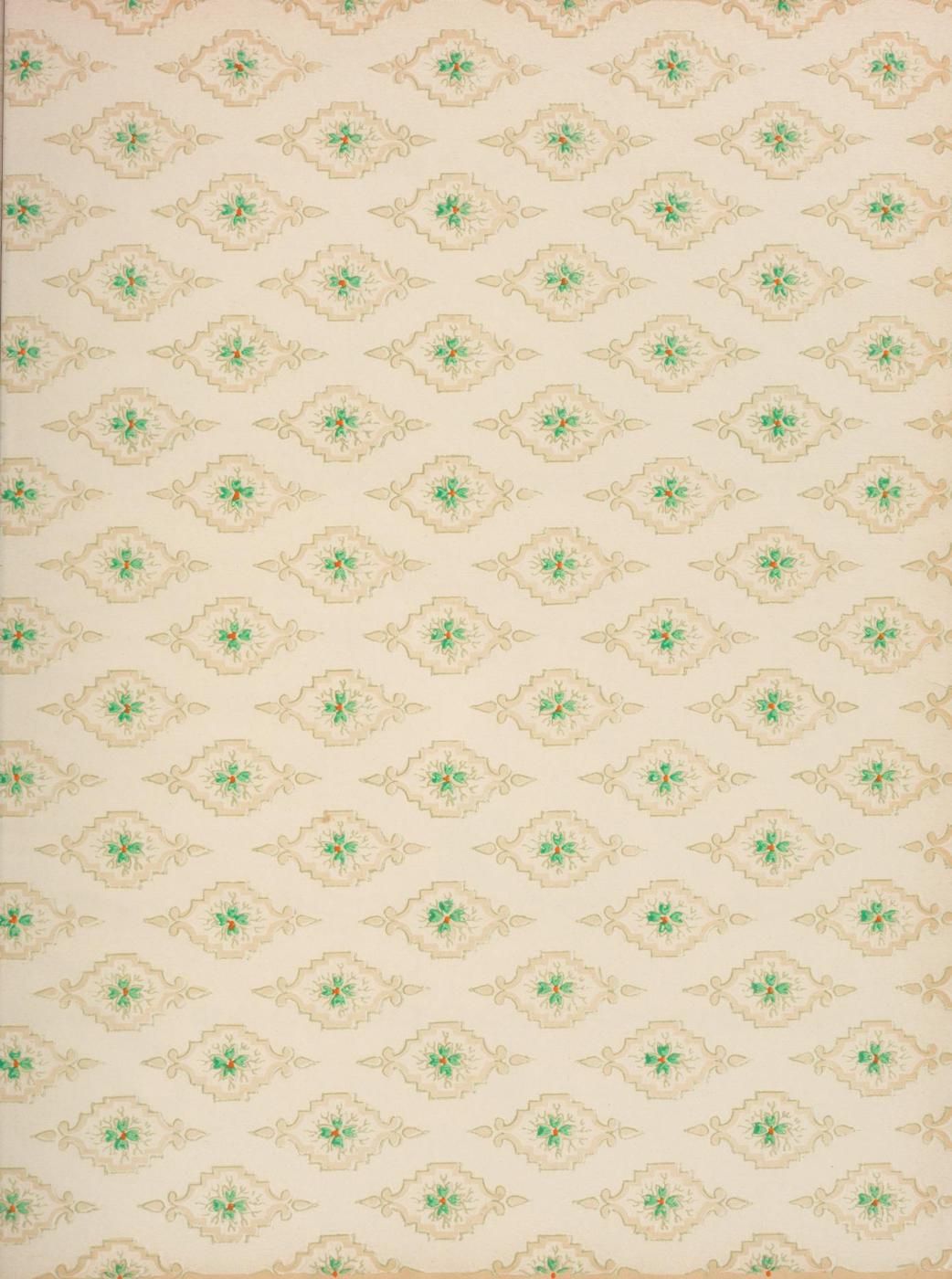 Close-up of a vintage wallpaper pattern with a repeating floral design in teal and gold on a creamy background.