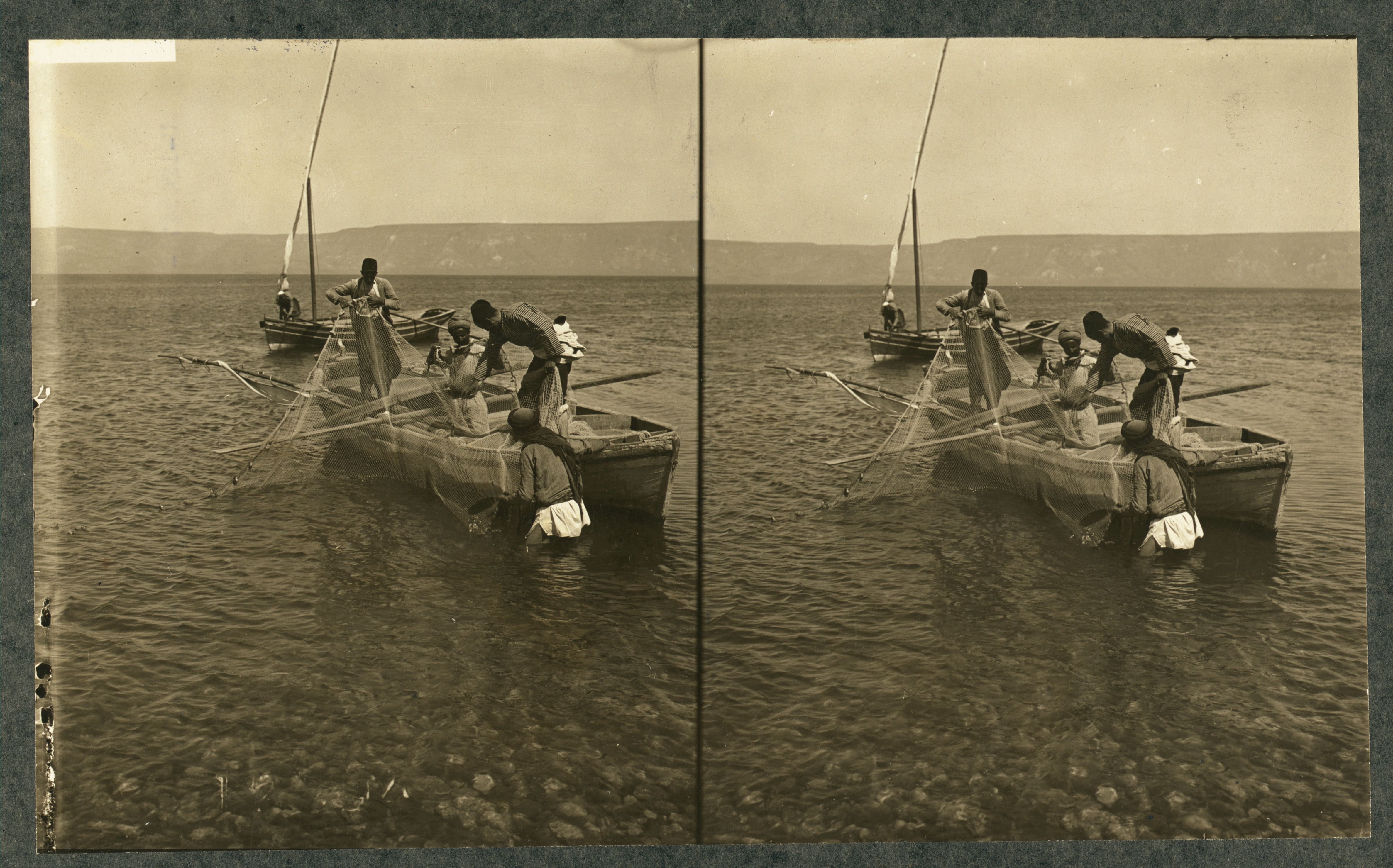 Stereoscopic photograph of a boat with people fishing on a body of water.