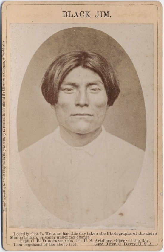 A vintage photograph of a Native American man named Black Jim, identified as a Modoc prisoner, with a certification statement signed by military officers.
