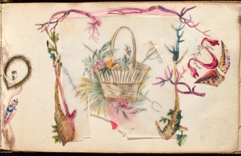 A vintage card with a woven basket overflowing with flowers and wheat, framed by decorative swags and ribbons.