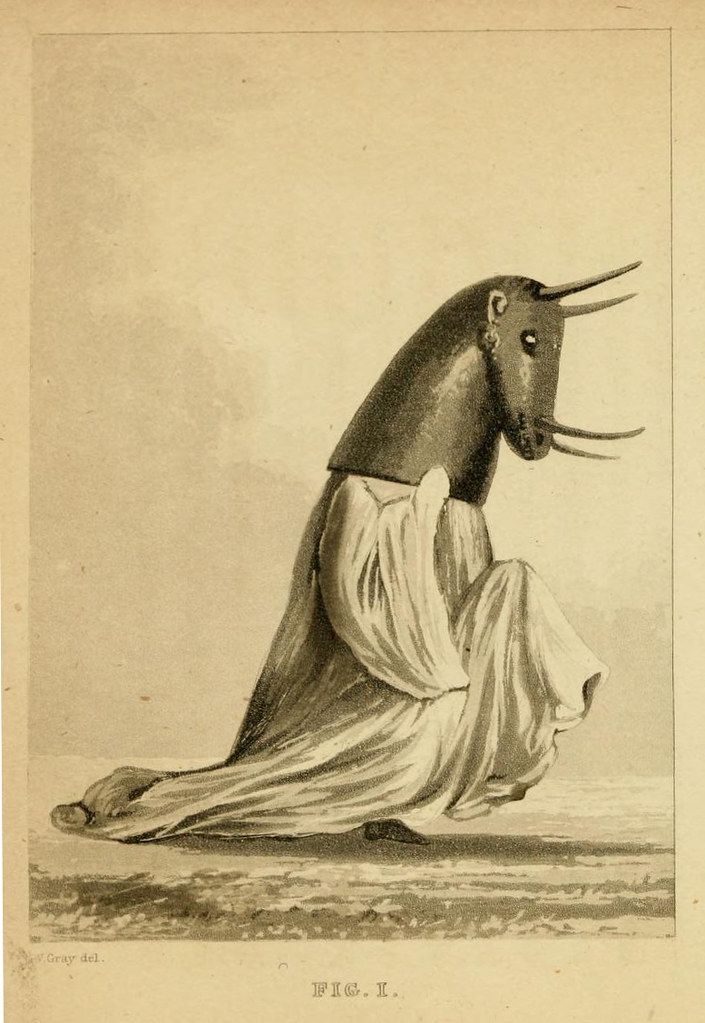 Vintage illustration of an animal with a bovine head draped in a long white garment, kneeling on a flat surface.