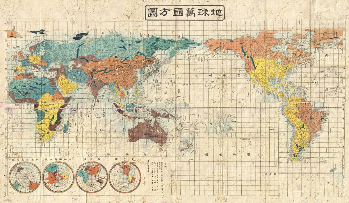 Vintage Japanese world map with grid lines and Japanese text.