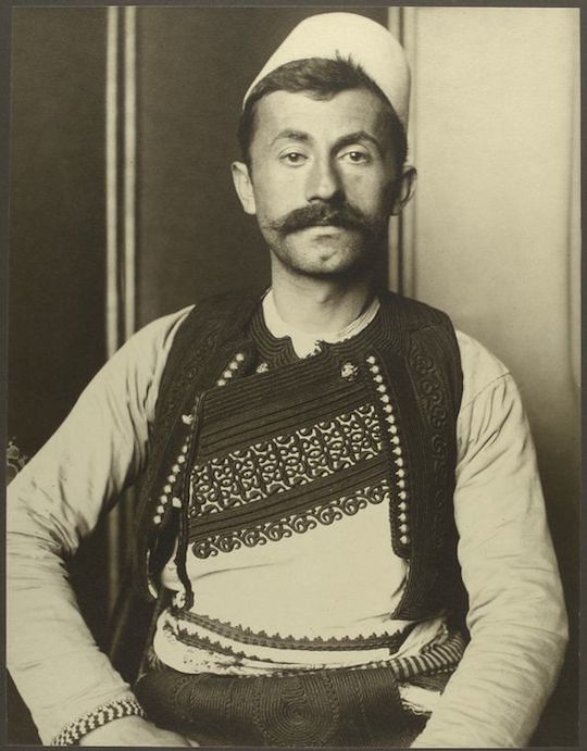 Vintage portrait of a man in traditional clothing.